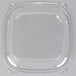 A clear Dart square plastic lid on a clear square plastic container.