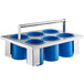 A Steril-Sil stainless steel drop-in flatware basket with blue solid cylinders.