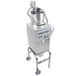 A Robot Coupe CL55 continuous feed food processor on a cart.