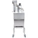 A stainless steel Robot Coupe CL55 food processor on a cart.