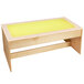 A wooden table with a yellow top and yellow LED lights.