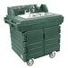 A green Cambro CamKiosk portable hand sink with two sinks on wheels.
