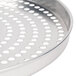 An American Metalcraft Super Perforated Aluminum Pizza Pan with holes in the bottom.
