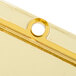 A gold colored Carlisle plastic lid with a spoon notch.