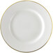 A white 10 Strawberry Street porcelain plate with gold rim.