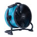 An XPOWER blue industrial axial fan with black legs.