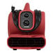 A red XPOWER compact air mover with black cords.