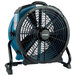 A blue and black XPOWER industrial axial fan on a stand.