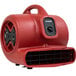 A red XPOWER air blower with a black handle.