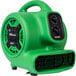 A green and black XPOWER compact air blower with black knobs.