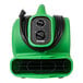 A close-up of a green and black XPOWER air mover with cords.