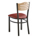 A Lancaster Table & Seating metal bistro chair with burgundy vinyl seat and natural wood back.