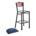 A Lancaster Table & Seating black bistro bar stool with a navy cushion and mahogany back.