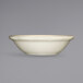 An International Tableware Victoria ivory stoneware bowl with a scalloped edge on a white background.