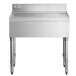 A Regency stainless steel underbar drainboard on a counter.