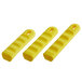 A group of three yellow silicone pan handle sleeves with holes.