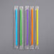 A group of 400 Choice neon plastic straws in plastic wrappers.