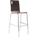A National Public Seating Bushwick bar height cafe chair with a metal frame and wooden seat in an espresso finish.