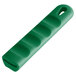 A green silicone pan handle sleeve with a hole for a pan handle.