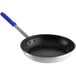 A close-up of a Choice aluminum non-stick fry pan with a blue handle.
