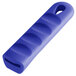 A blue silicone pan handle sleeve with a hole.