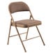 A National Public Seating brown metal folding chair with brown padded fabric seat.
