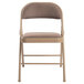 A brown National Public Seating Commercialine folding chair with a tan cushion.