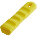 A yellow silicone handle sleeve with a hole.