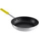 A Choice non-stick frying pan with a yellow handle.