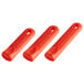 A group of red silicone pan handle sleeves.