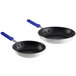 Two Choice aluminum frying pans with blue silicone handles.