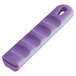 A purple silicone pan handle sleeve with a hole in the end.