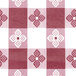 A red and white checkered patterned Intedge vinyl table cover.