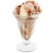 A Libbey sundae glass filled with brown and white ice cream.