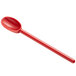 A red spoon with a handle.