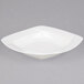A CAC Garden State white square porcelain bowl with a wavy design.