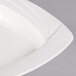 A CAC white square porcelain pasta bowl with a curved edge.
