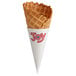 A JOY waffle cone with a red logo.
