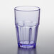 A clear plastic tumbler with a blue rim.
