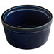 An Acopa Keystone Azora Blue stoneware ramekin with a black rim.