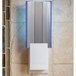 A white rectangular DynaTrap Flylight with a blue light on it.