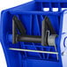A blue plastic Lavex mop bucket with a black wringer.
