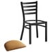 A Lancaster Table & Seating black ladder back chair with a light brown vinyl padded seat.