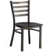A black metal Lancaster Table & Seating ladder back chair with a black wood seat.