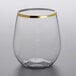 A Visions clear plastic stemless wine glass with a gold rim.