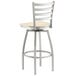A Lancaster Table & Seating swivel bar stool with a natural wood seat and metal frame.