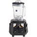 A black AvaMix commercial blender with a clear Tritan container and black and silver lid.