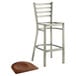 A Lancaster Table & Seating metal bar stool with a wood seat.