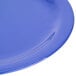 A close-up of a blue Carlisle Dallas Ware melamine plate with a curved edge.