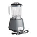 An AvaMix commercial blender with a cord attached.